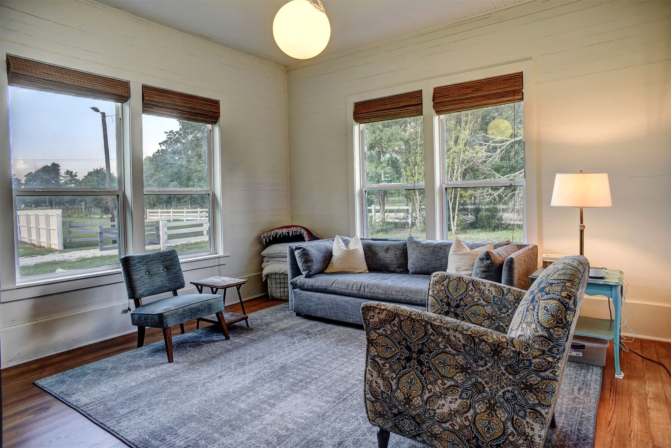 141 Grassyville Road Paige, TX 78659 - Photo 13 of 34 a living room with furniture and a large window