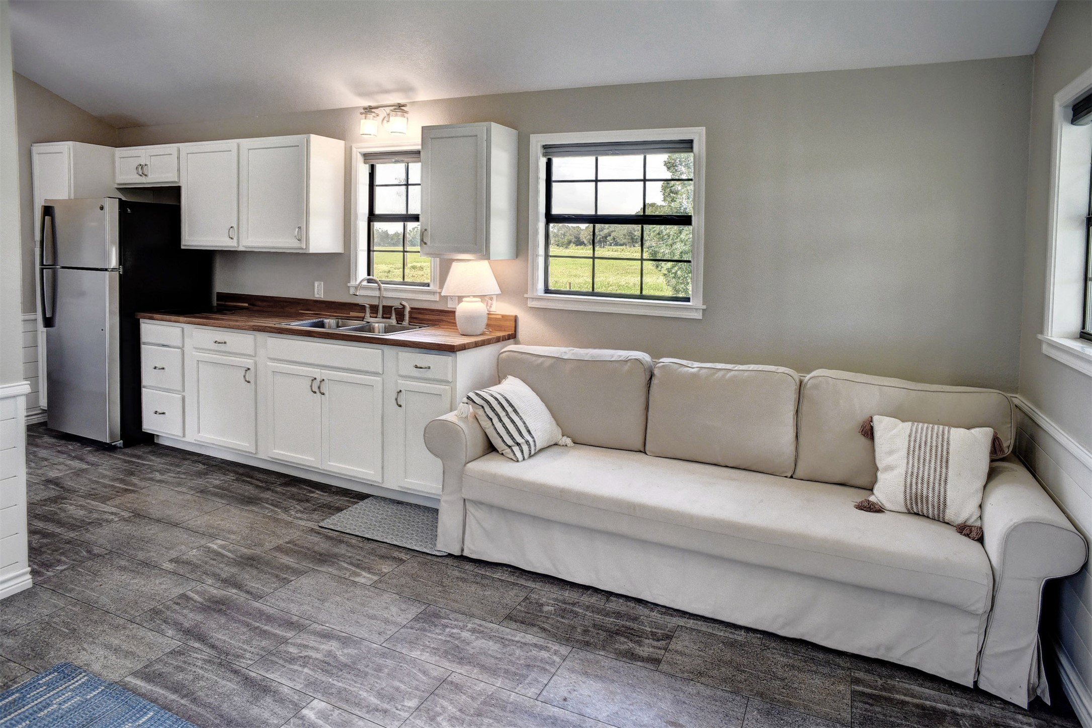 141 Grassyville Road Paige, TX 78659 - Photo 21 of 34 a living room with granite countertop furniture and fireplace