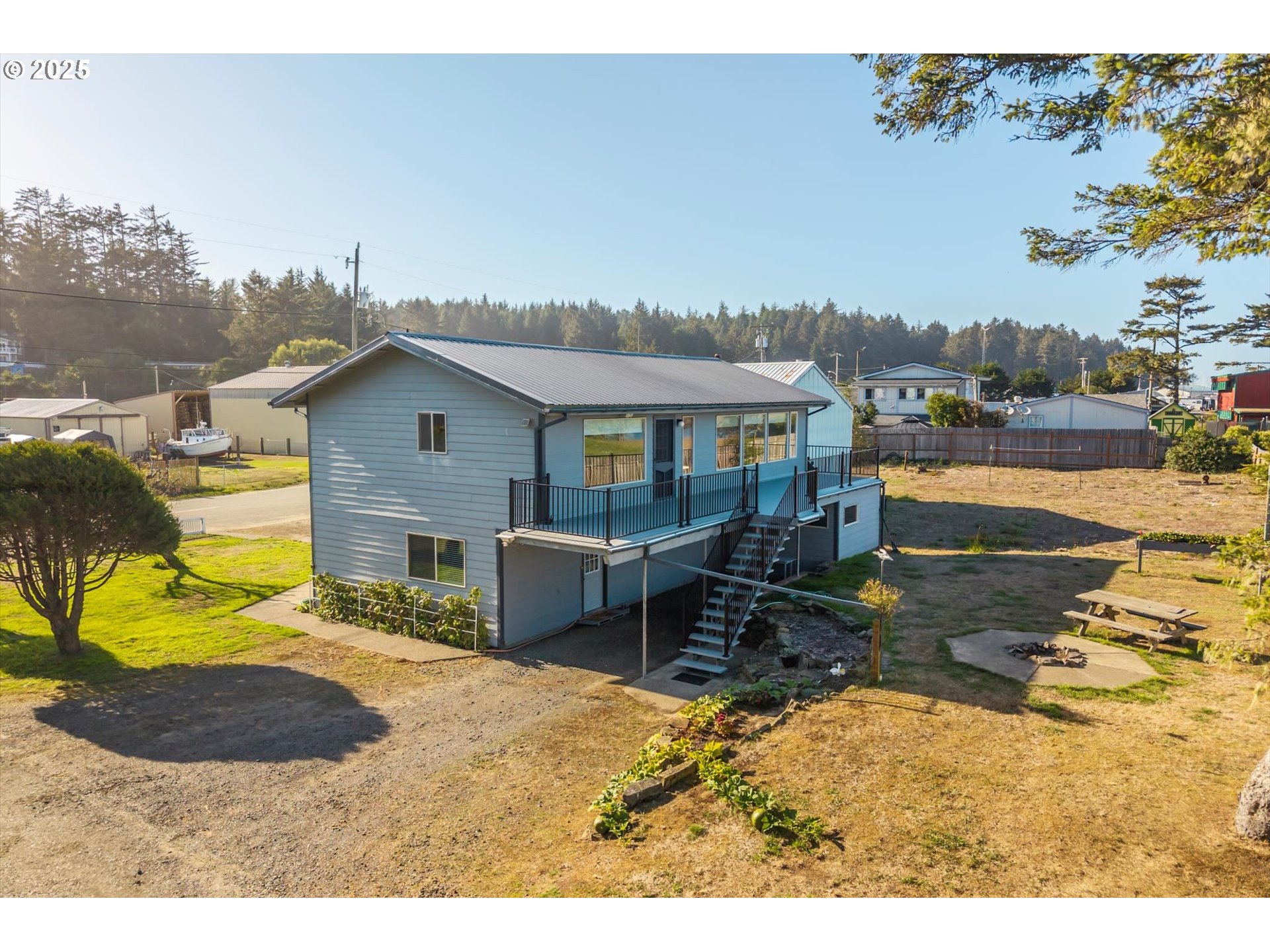 63347 Charleston Road Coos Bay, OR 97420 - Photo 1 of 48 a view of a swimming pool with a patio