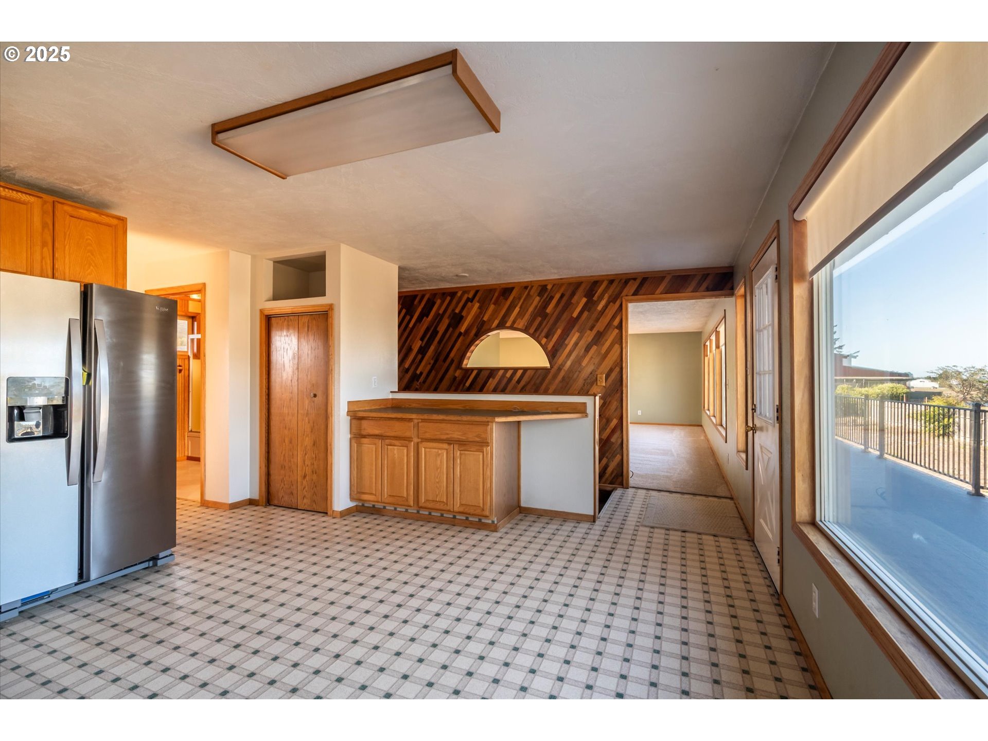 63347 Charleston Road Coos Bay, OR 97420 - Photo 12 of 48 a picture of a living room with a fireplace