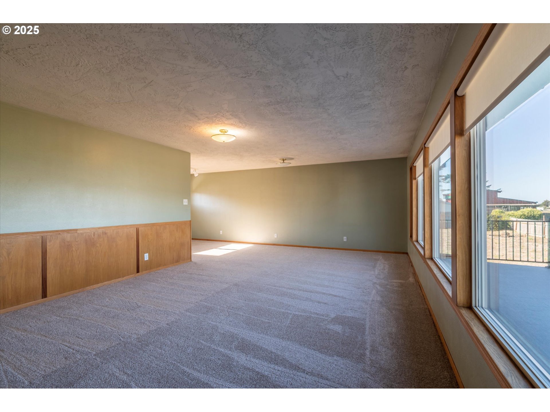 63347 Charleston Road Coos Bay, OR 97420 - Photo 13 of 48 a view of an empty room with a window