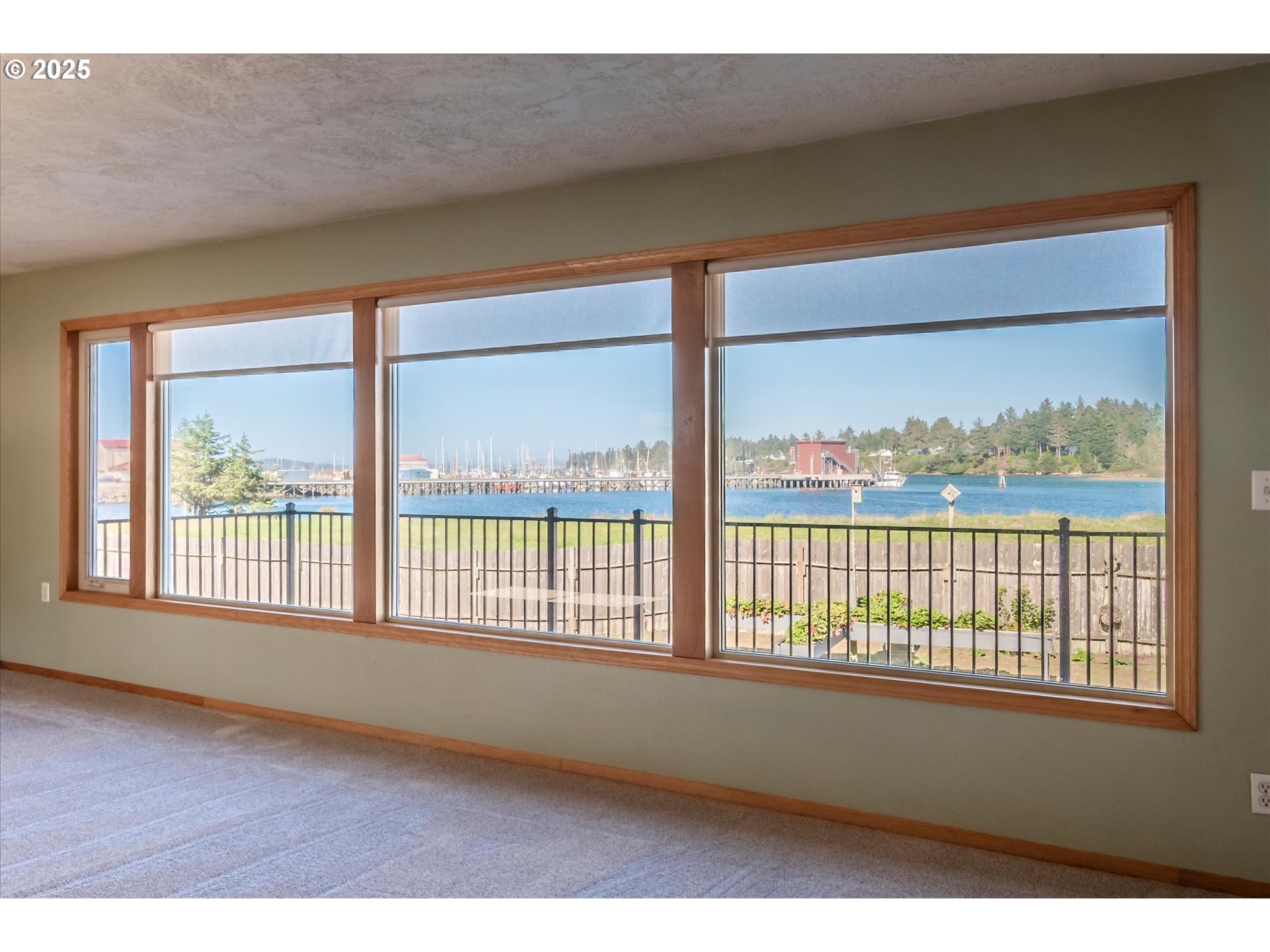 63347 Charleston Road Coos Bay, OR 97420 - Photo 15 of 48 a view of an empty room with a window