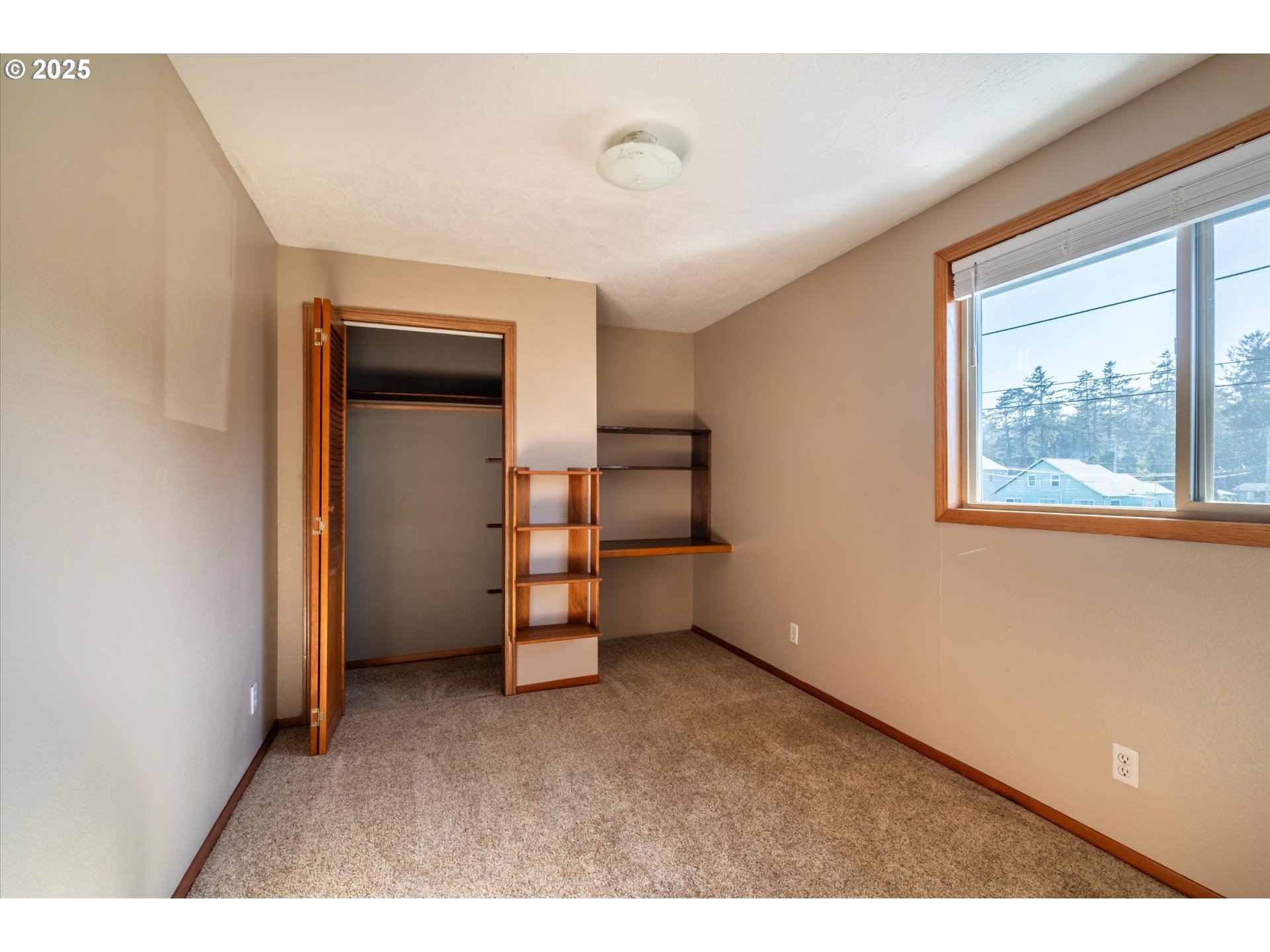 63347 Charleston Road Coos Bay, OR 97420 - Photo 23 of 48 a view of an empty room with a window