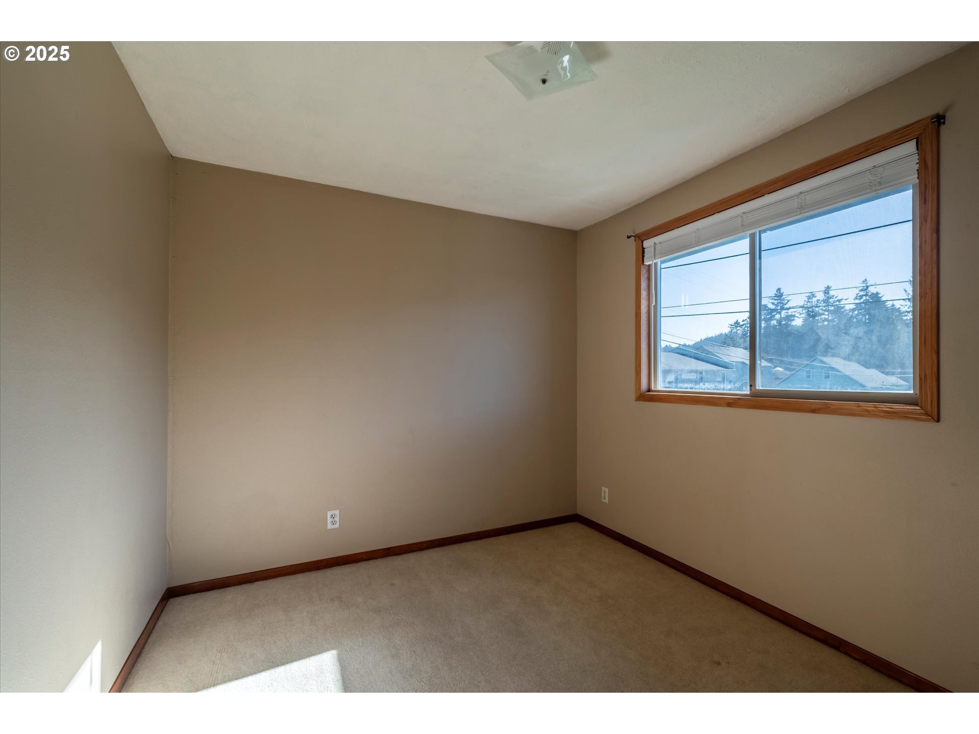 63347 Charleston Road Coos Bay, OR 97420 - Photo 26 of 48 a view of an empty room with a window