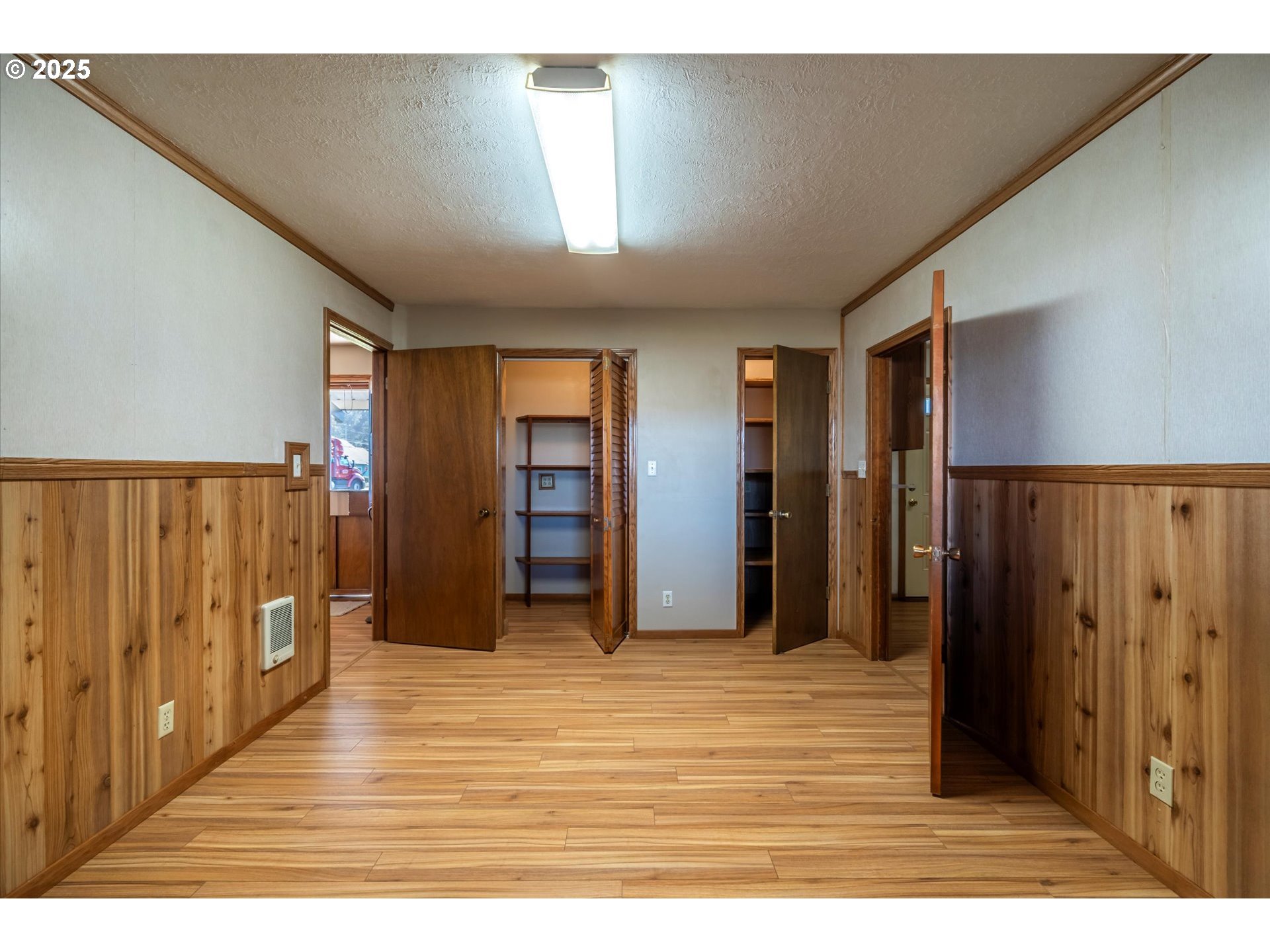 63347 Charleston Road Coos Bay, OR 97420 - Photo 33 of 48 a view of a livingroom with wooden floor