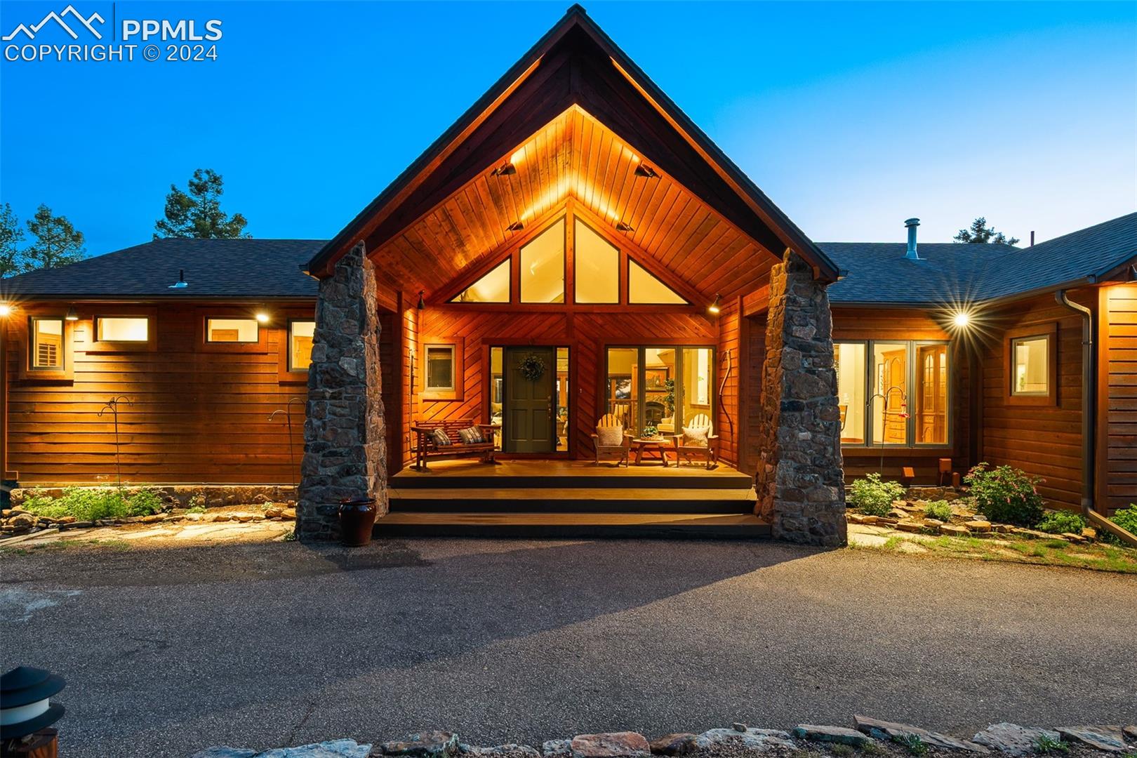 2755 Elk Ridge South Divide, CO 80814 - Photo 1 of 14 Large covered front porch and grand entrance