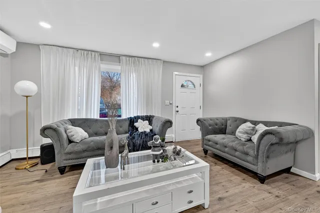 a living room with furniture and a couch