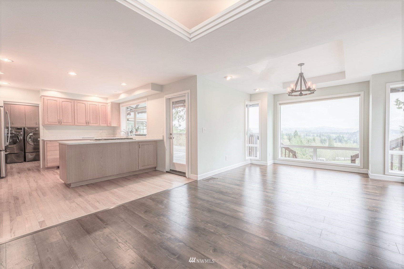 10029 Wagner Road Snohomish, WA 98290 - Photo 13 of 40 a view of a kitchen with wooden floor and a window