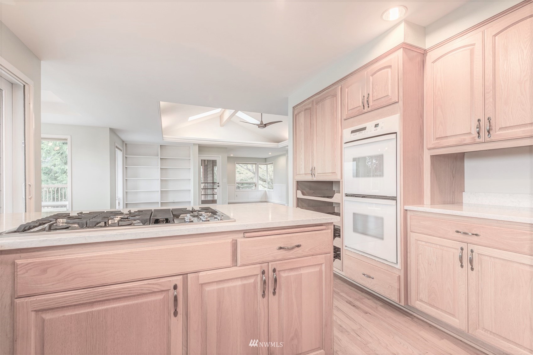 10029 Wagner Road Snohomish, WA 98290 - Photo 17 of 40 a kitchen with stainless steel appliances granite countertop a sink and dishwasher with white cabinets
