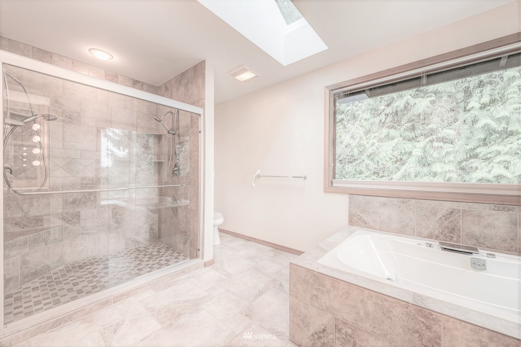 10029 Wagner Road Snohomish, WA 98290 - Photo 22 of 40 a bathroom with a bathtub and shower