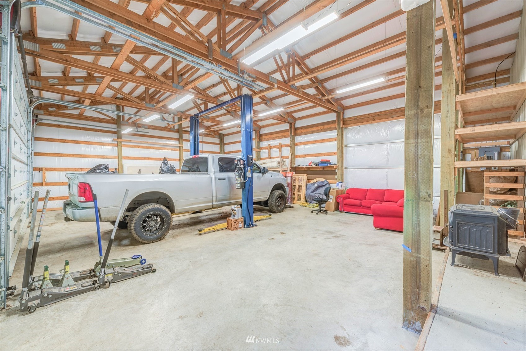 10029 Wagner Road Snohomish, WA 98290 - Photo 34 of 40 a view of a garage with parked cars