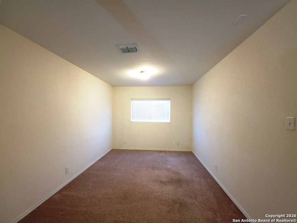 3907 Paradiso Loop San Antonio, TX 78260 - Photo 20 of 30 an empty room with a empty space and a window