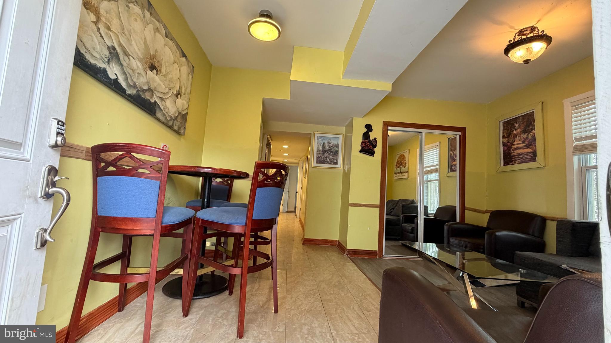 830 19th Street Northeast Washington, DC 20002 - Photo 3 of 13 a view of a dining room with furniture and chandelier