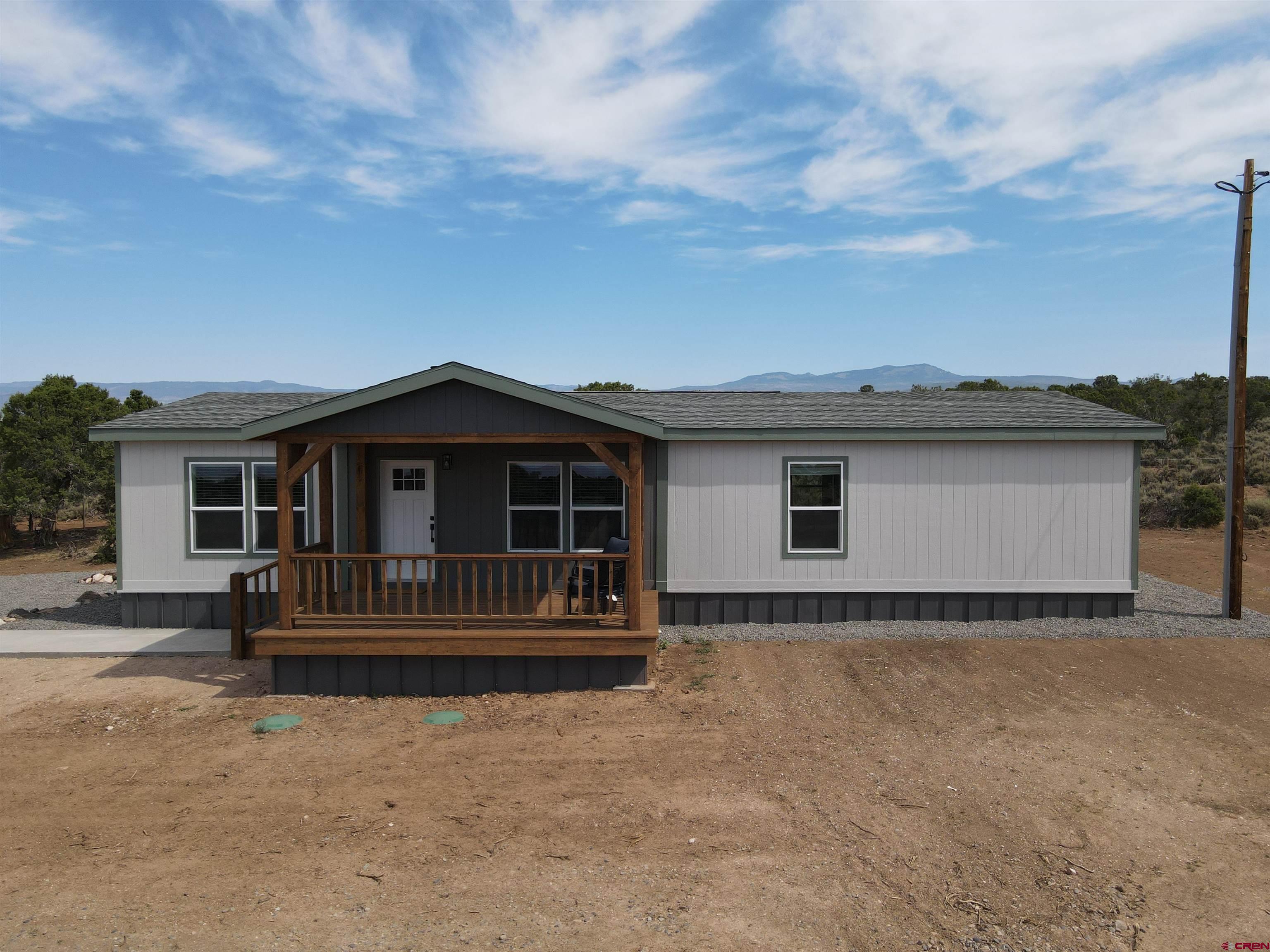 29173 P 50 Road Hotchkiss, CO 81419 - Photo 24 of 38 front view of a house with a fence