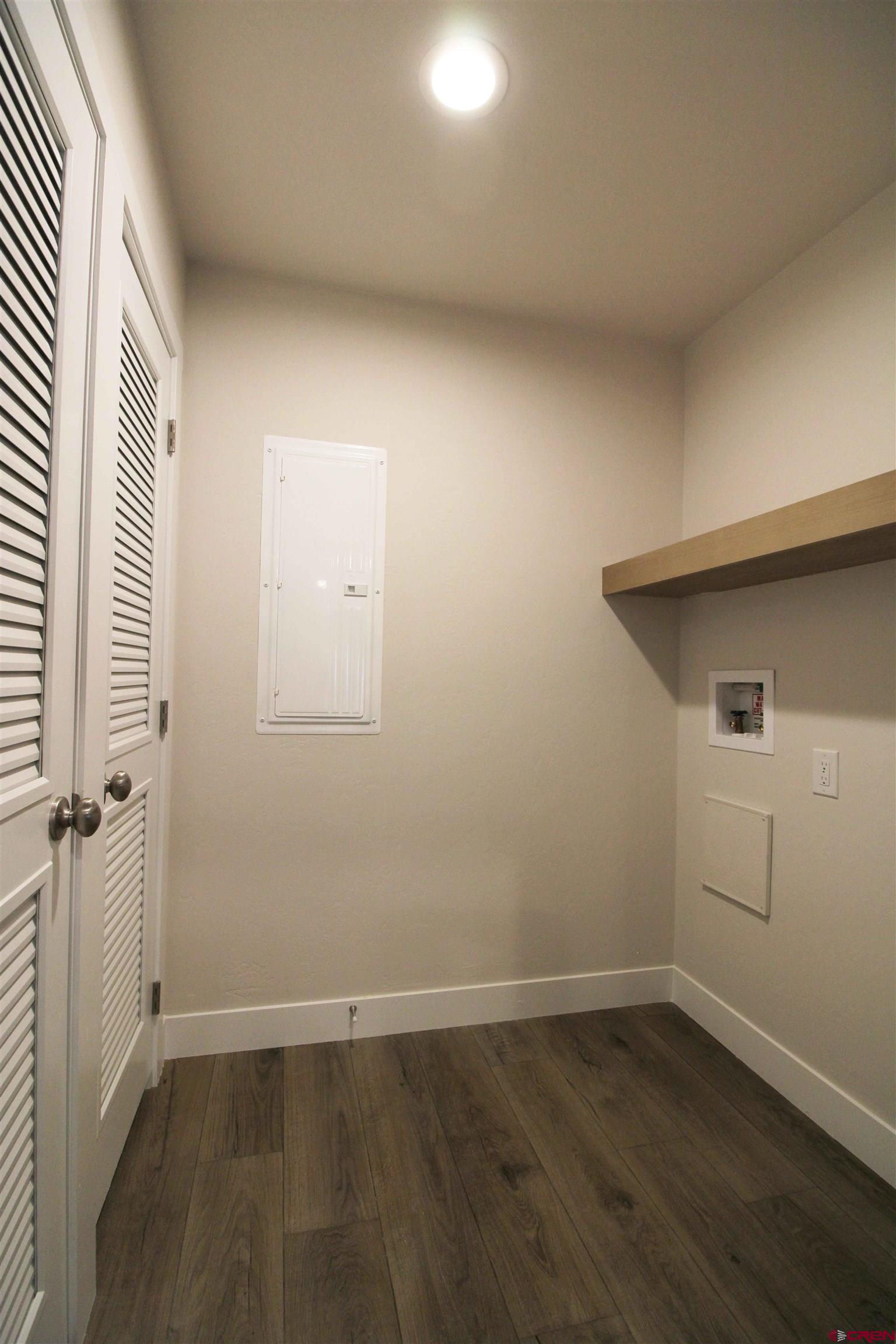 29173 P 50 Road Hotchkiss, CO 81419 - Photo 31 of 38 an empty room with wooden floor and windows