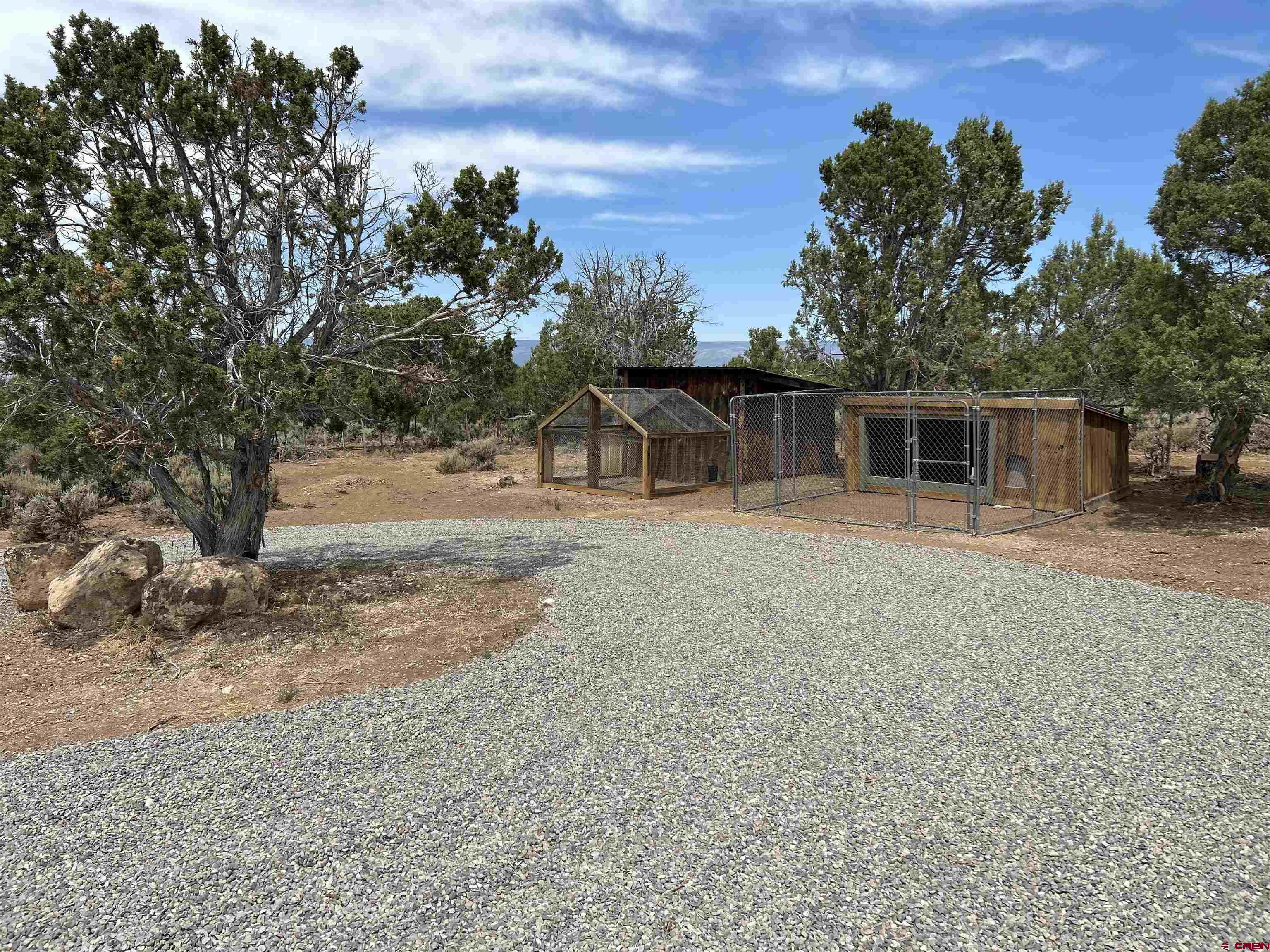29173 P 50 Road Hotchkiss, CO 81419 - Photo 9 of 38 a view of a house with a backyard