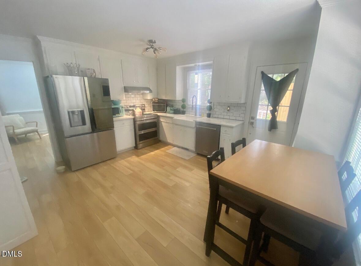 7709 Highlandview Circle Raleigh, NC 27613 - Photo 4 of 8 Stubbs kitchen