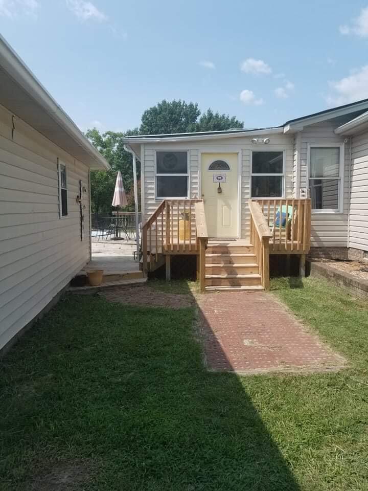 315 Green Lake Road Rockingham, NC 28379 - Photo 11 of 47 Space between house and the detached garage.