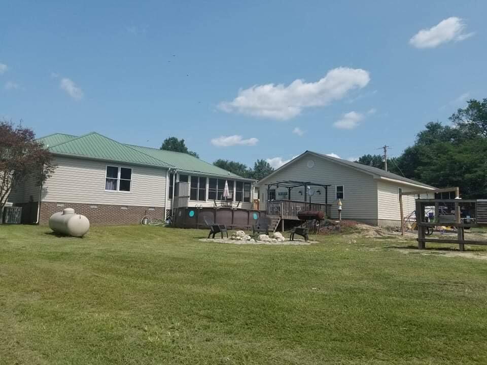315 Green Lake Road Rockingham, NC 28379 - Photo 10 of 47 Back of house and two car garage