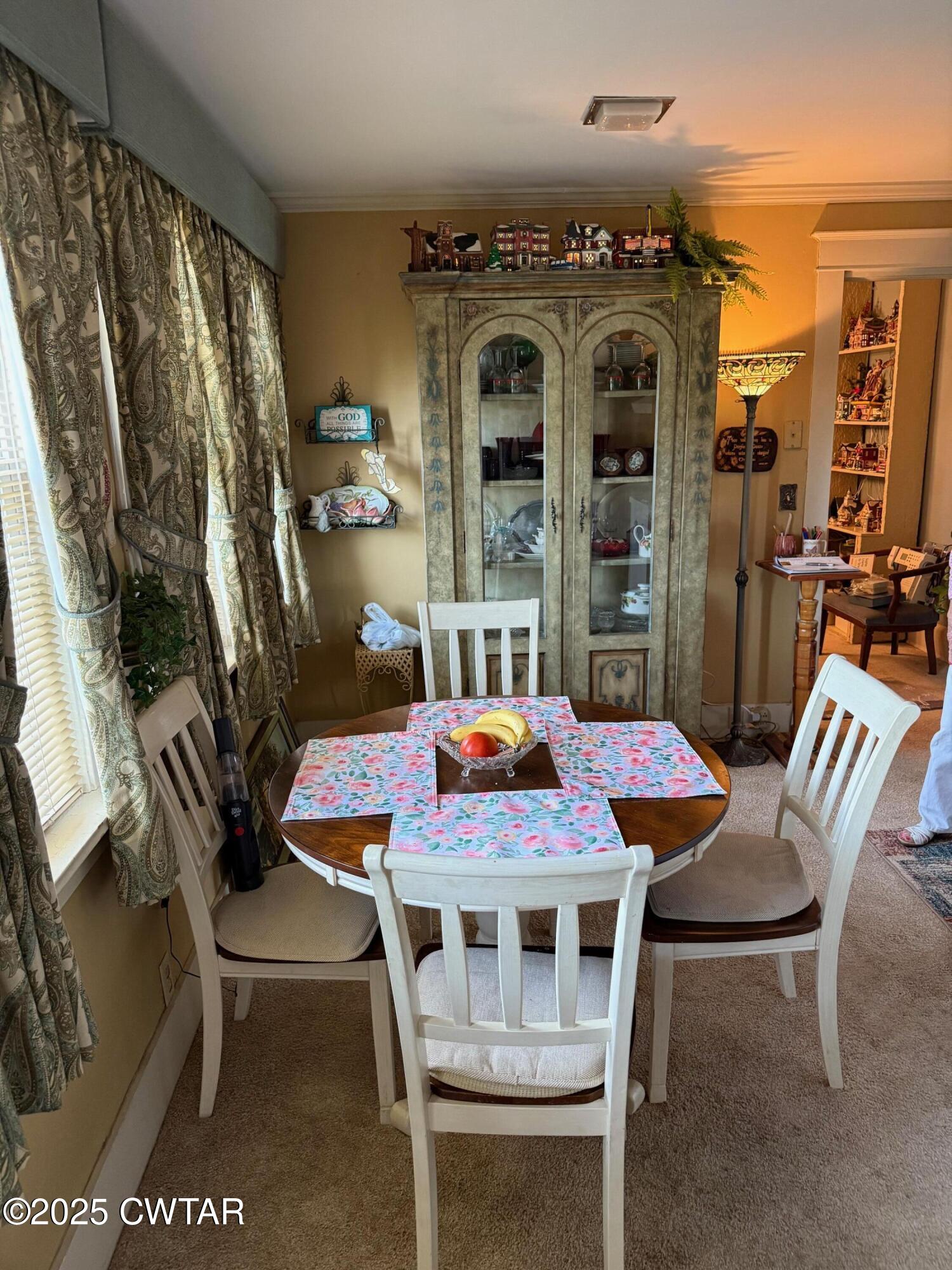 209 North Main Street Ridgely, TN 38080 - Photo 16 of 58 a view of a dining room with furniture