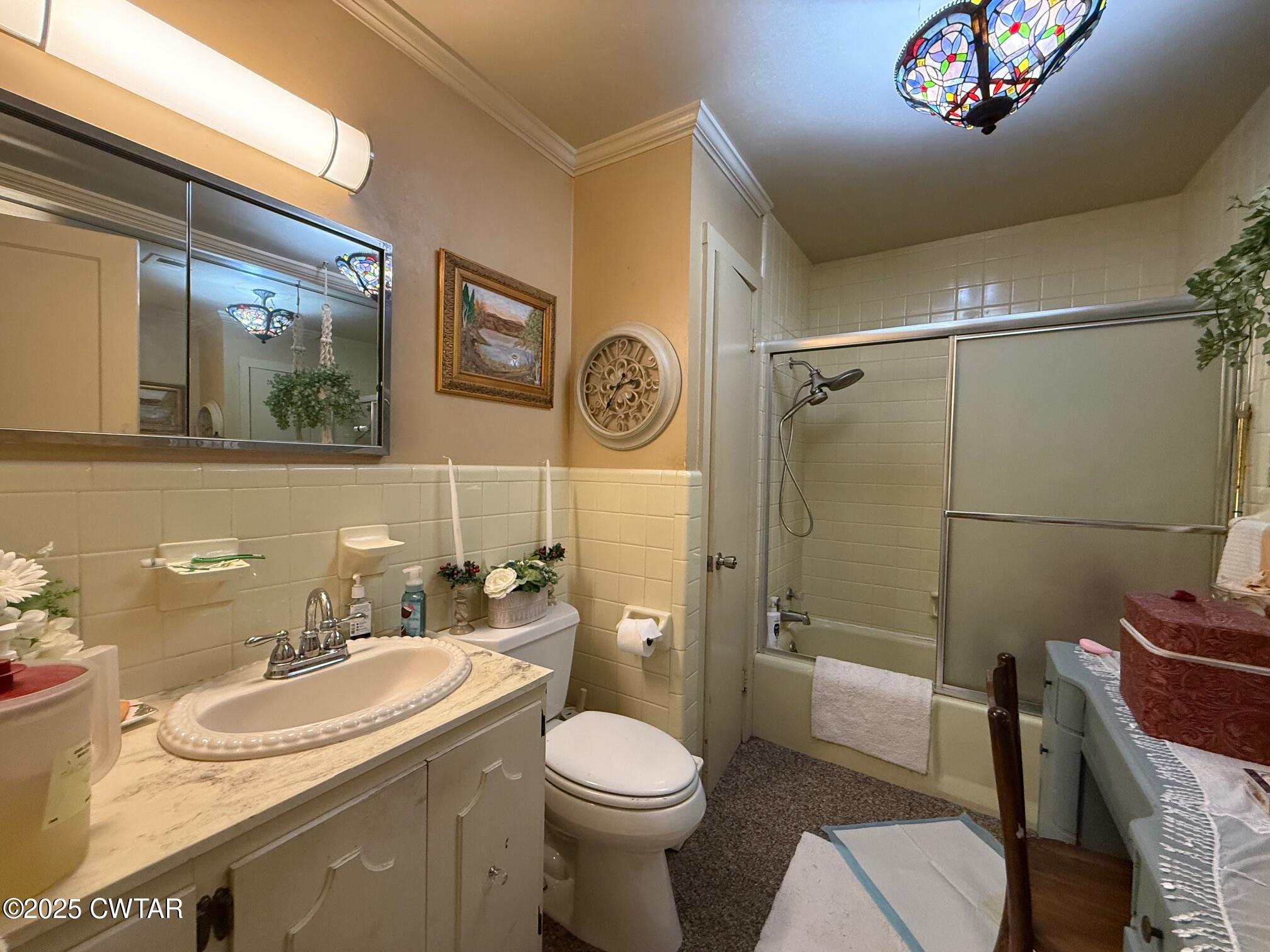 209 North Main Street Ridgely, TN 38080 - Photo 23 of 58 a bathroom with a sink toilet and shower