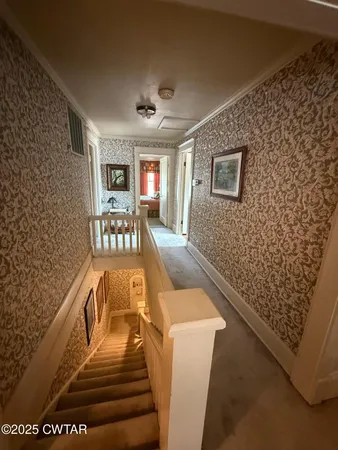 a bathroom with a sink toilet and mirror