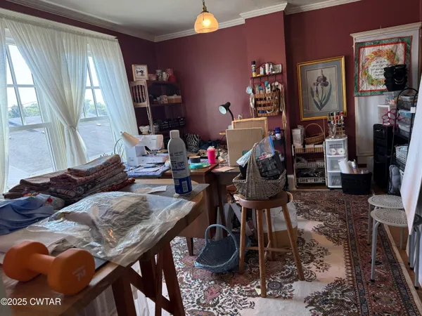 a bathroom with a toilet a sink and a mirror