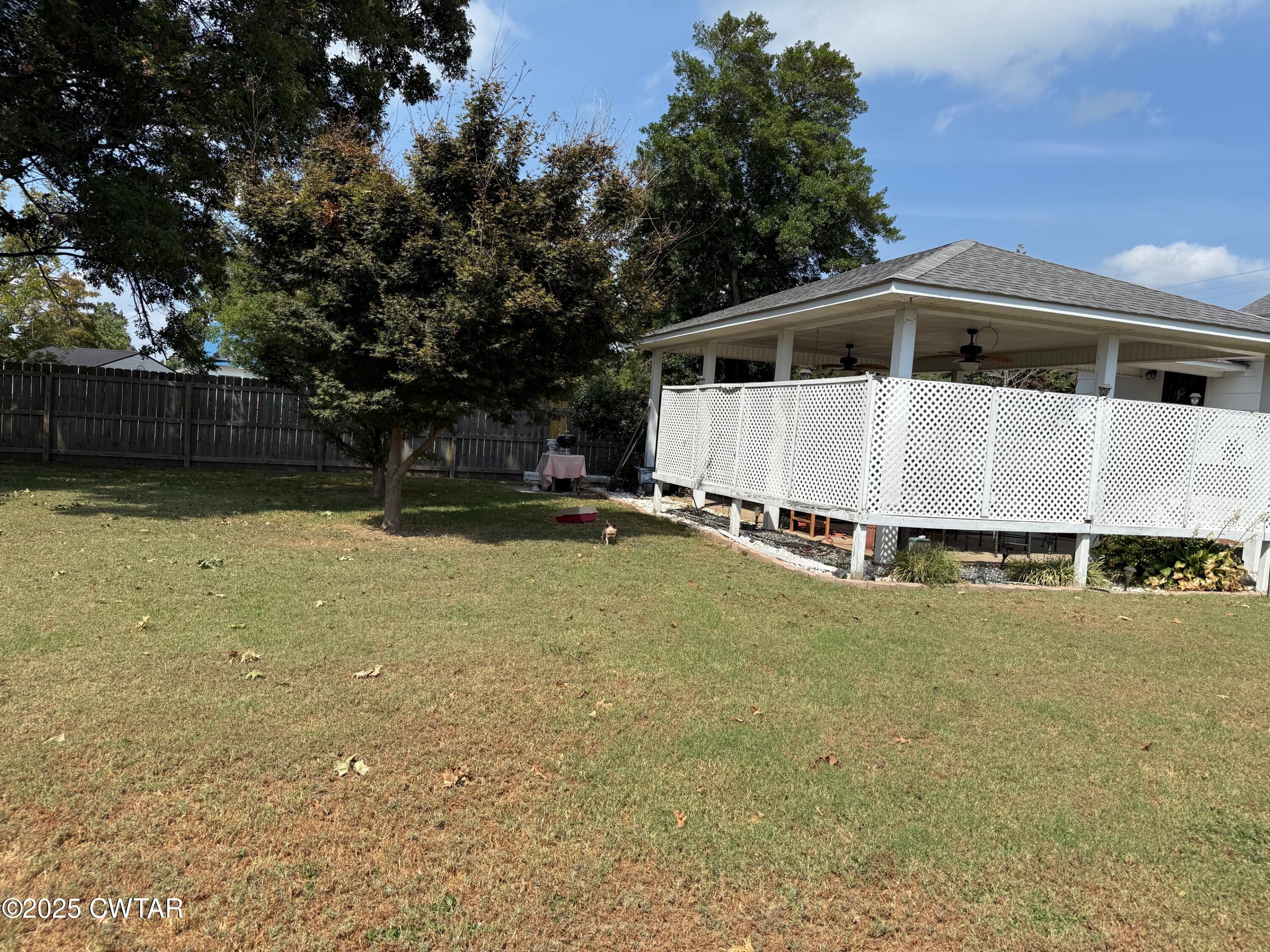 209 North Main Street Ridgely, TN 38080 - Photo 48 of 58 a front view of a house with a yard