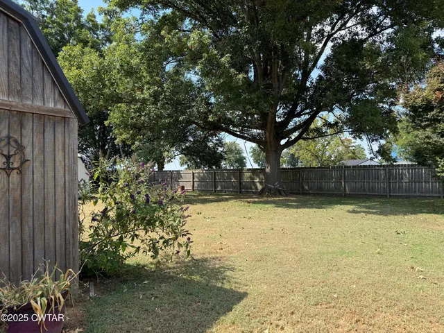 a room with furniture workspace and wooden floor