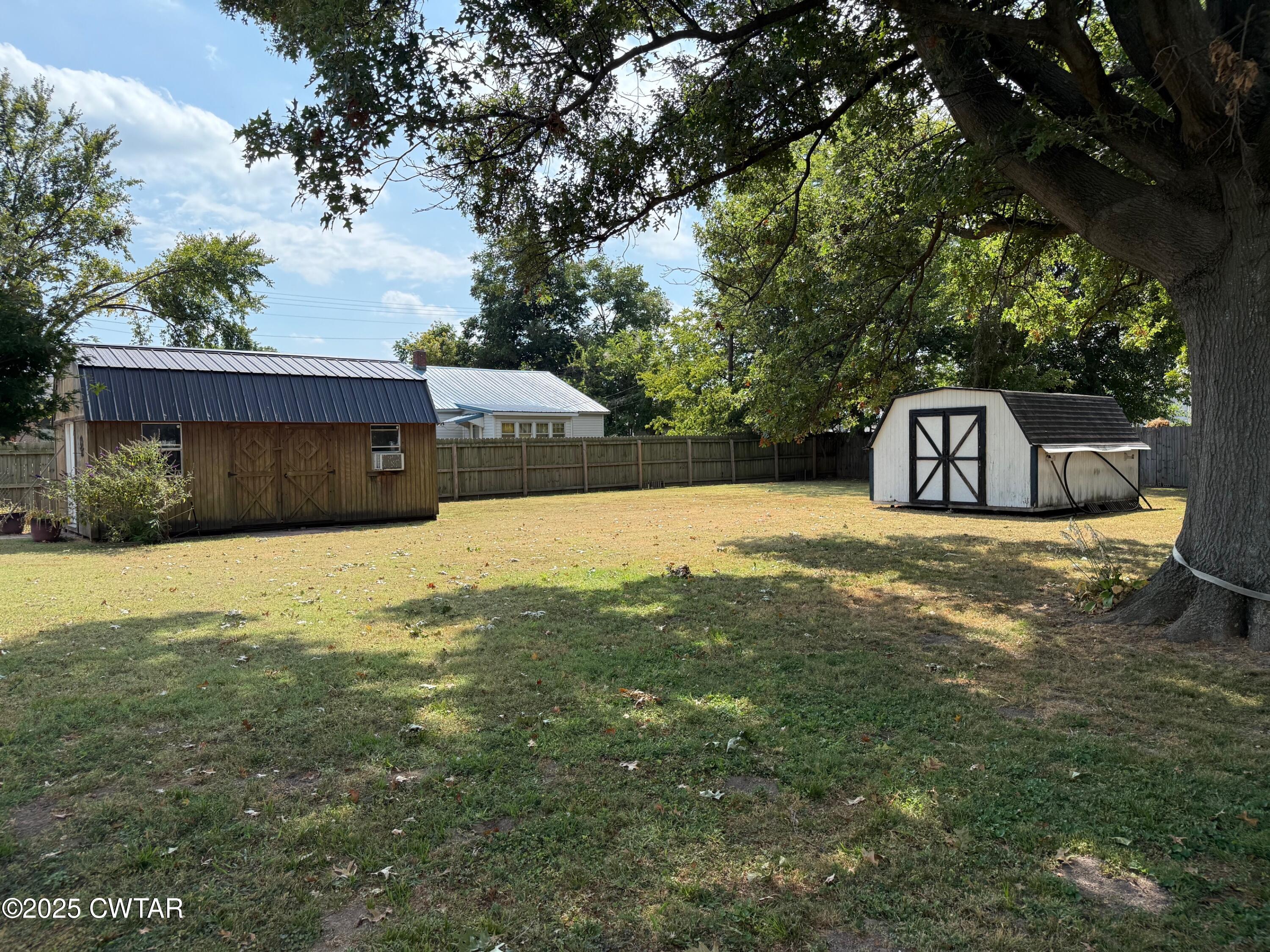209 North Main Street Ridgely, TN 38080 - Photo 51 of 58 a view of a house with a yard