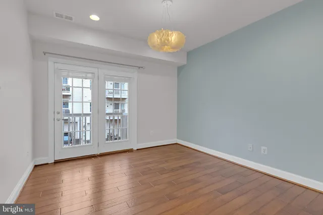 a view of an empty room and window