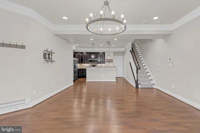a front view of a house with a street