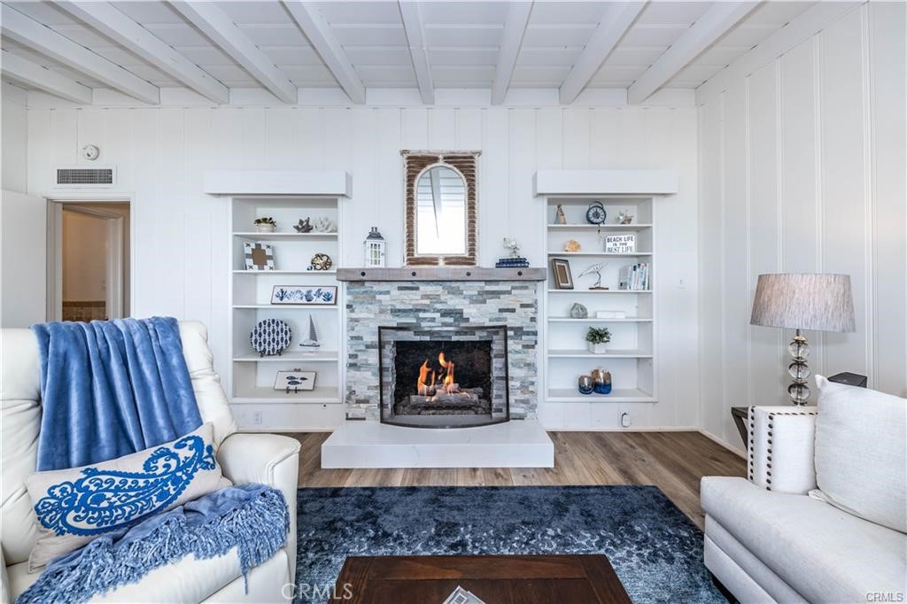 35325 Beach Road Dana Point, CA 92624 - Photo 14 of 44 a living room with furniture and a fireplace