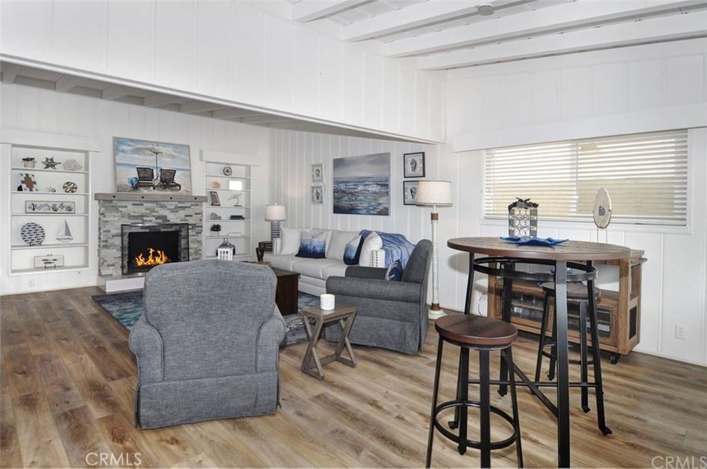 35325 Beach Road Dana Point, CA 92624 - Photo 20 of 44 a living room with furniture and a fireplace