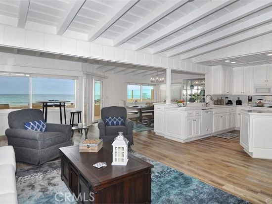 35325 Beach Road Dana Point, CA 92624 - Photo 28 of 44 a living room with furniture and kitchen view