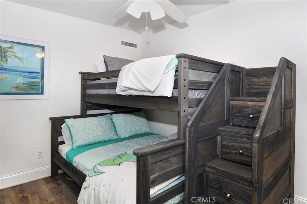 35325 Beach Road Dana Point, CA 92624 - Photo 31 of 44 a bedroom with furniture and a ceiling fan