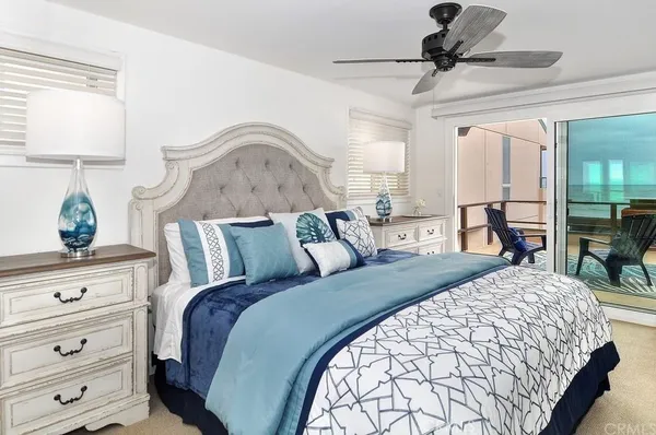 a bed room with a bed and a dresser
