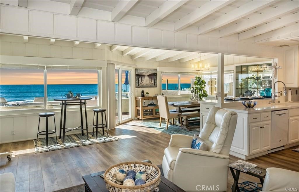 35325 Beach Road Dana Point, CA 92624 - Photo 8 of 44 a living room with fireplace furniture and a large window