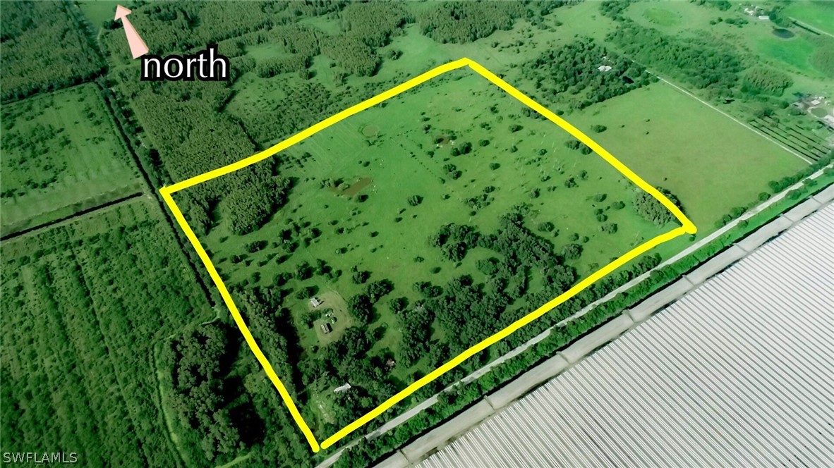 1600-1800 G Road LaBelle, FL 33935 - Photo 4 of 10 a view of a large area with a garden