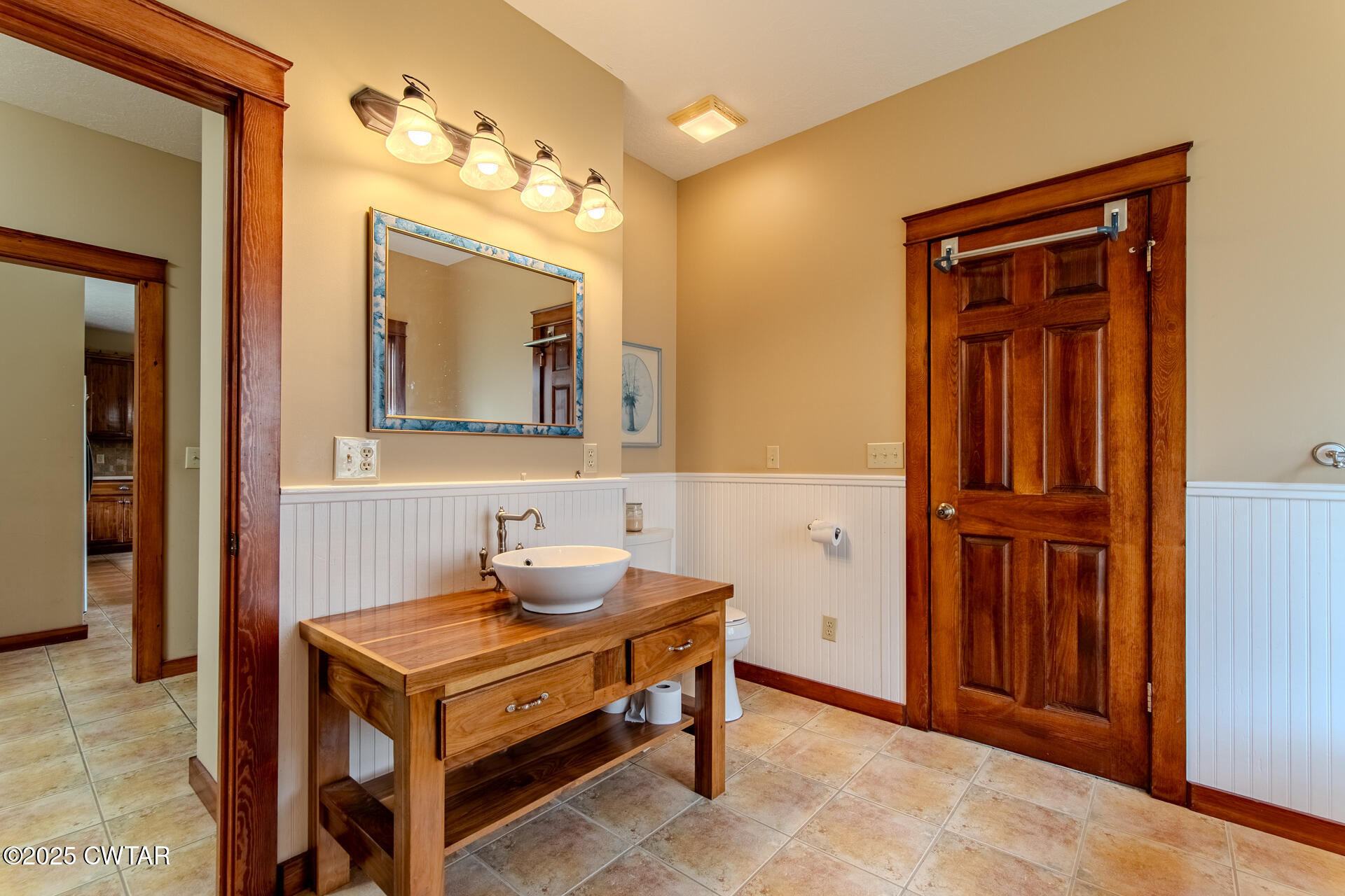 3554 Shades Bridge Road Greenfield, TN 38230 - Photo 23 of 49 a bathroom with a sink a mirror and a vanity