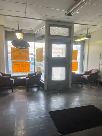 a view of a living room and a kitchen