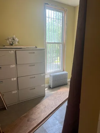 a view of a room with rack on the wall