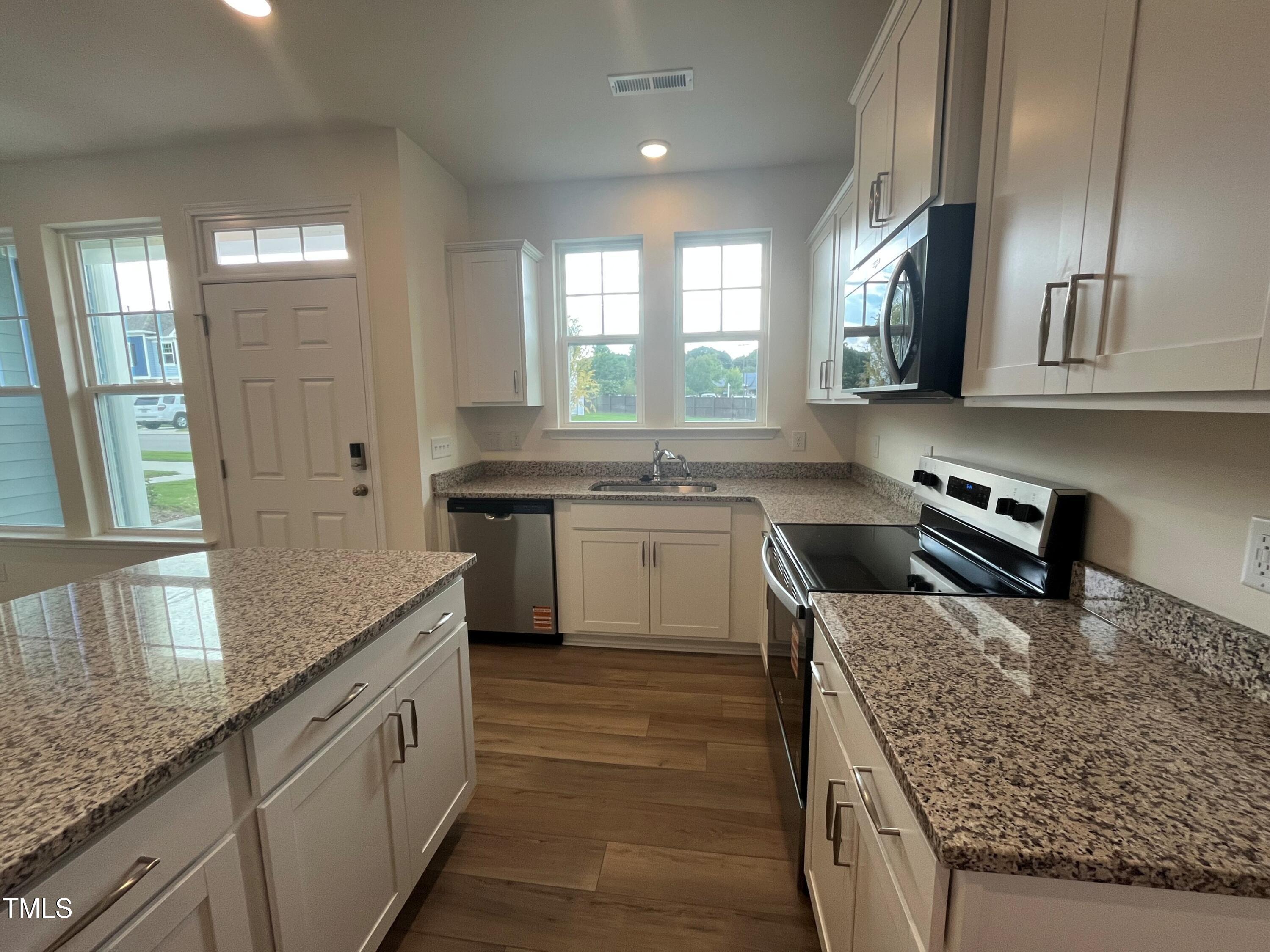 6123 Arsenal Avenue Raleigh, NC 27610 - Photo 8 of 56 Kitchen w/lots of Windows