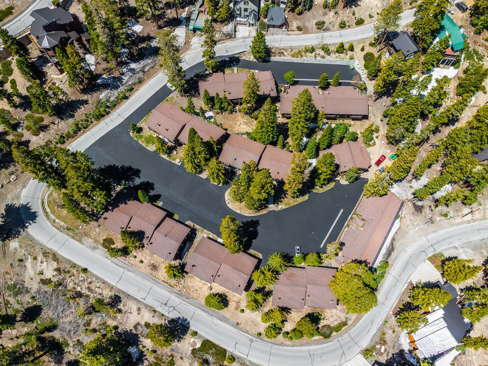 94 John Muir Road, Unit 132 Mammoth Lakes, CA 93546 - Photo 57 of 58 an aerial view of a house with a swimming pool