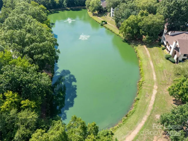 a view of a lake with a yard