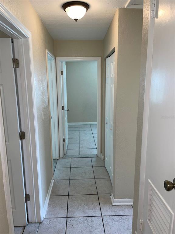 531 Springfield Street Deltona, FL 32725 - Photo 17 of 23 a view of a hallway