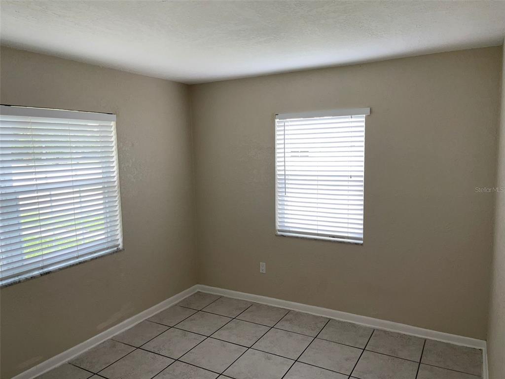 531 Springfield Street Deltona, FL 32725 - Photo 18 of 23 an empty room with a window