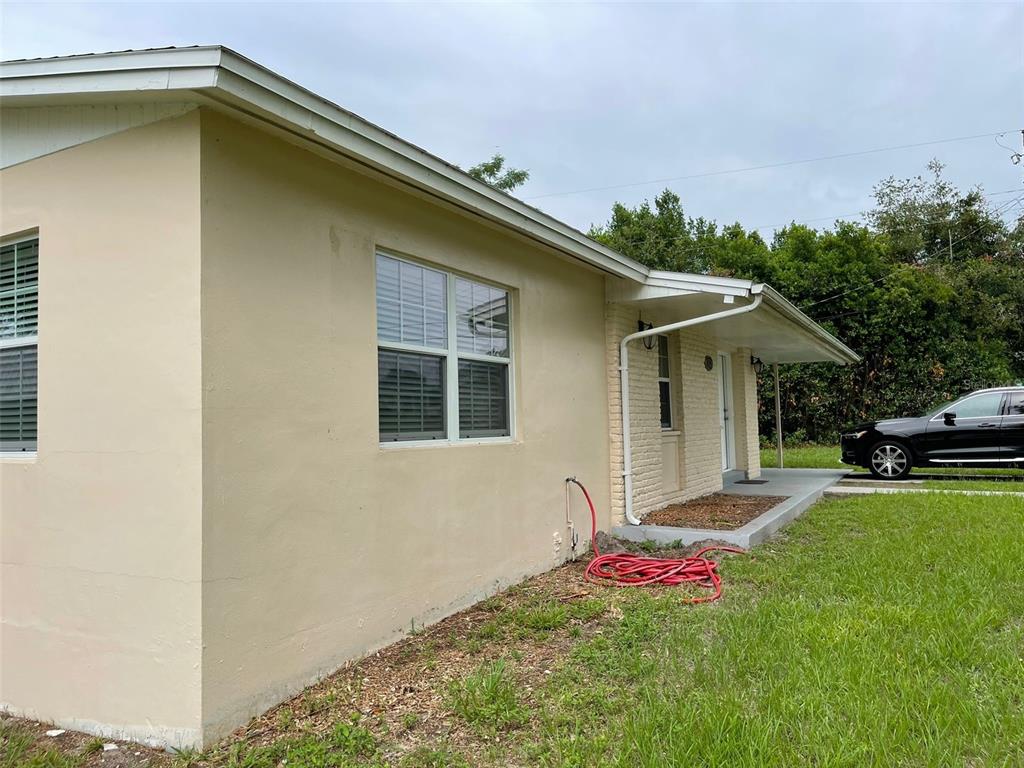 531 Springfield Street Deltona, FL 32725 - Photo 5 of 23 a front view of a house with a yard