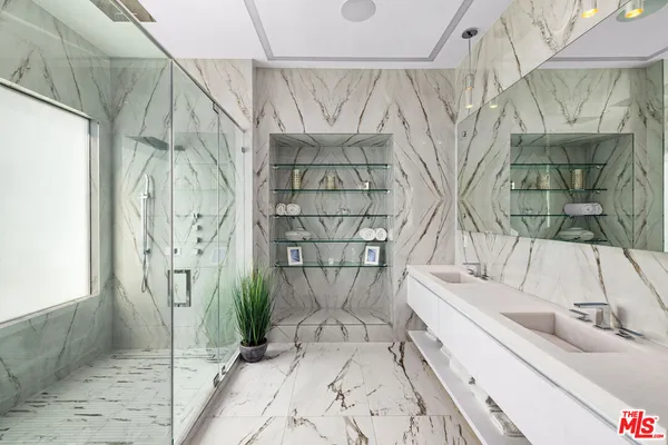 a bathroom with a sink and a shower