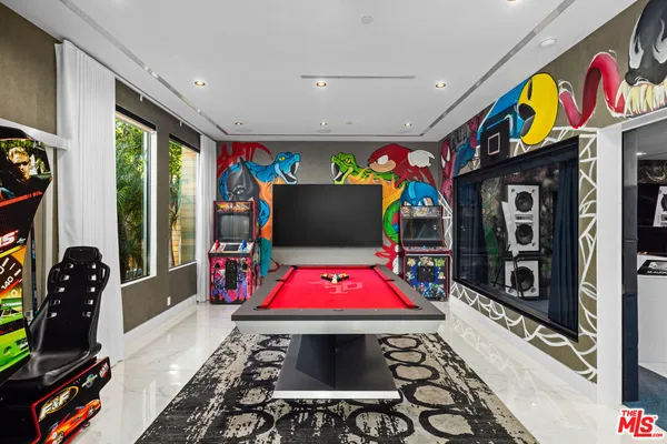 a very nice looking room with a flat screen tv